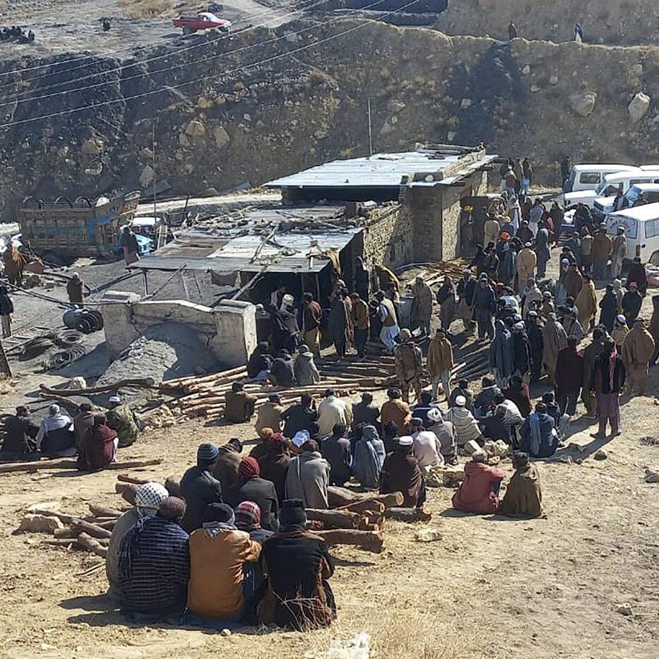 Rescuers in southwestern Pakistan recover the bodies of 11 workers who died in a coal mine blast